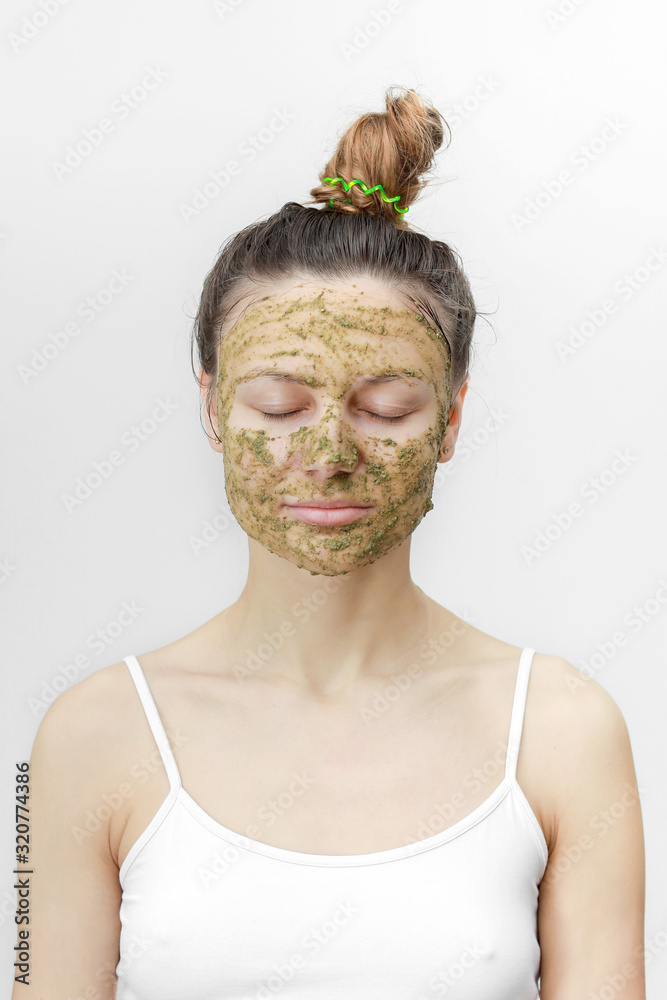 Beautiful woman with natural face mask clean skin rejuvenation isolated on white background