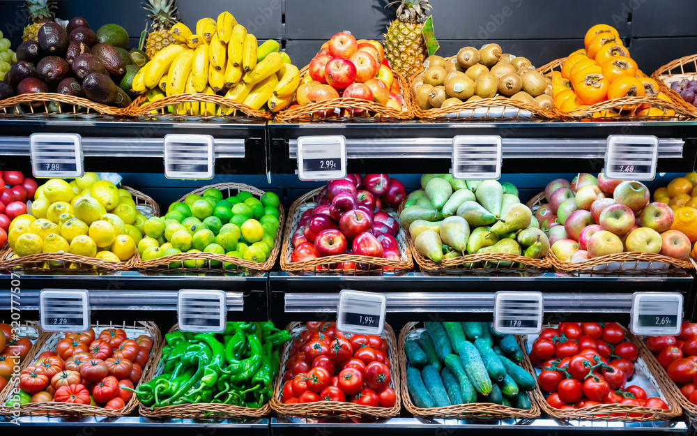 Vegetables and fruits on supermarket shelves