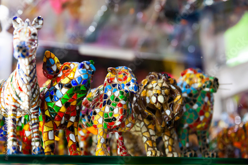 Colorful Mosaic figures - Souvenirs of Barcelona on showcase