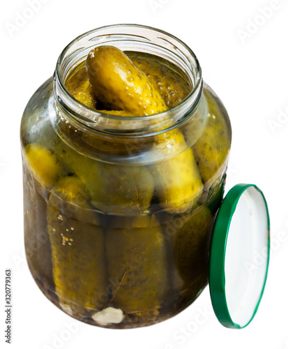 Marinated cucumbers in glass jar