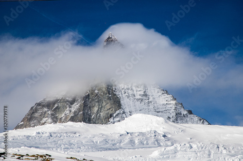 view of Matterhorn peak against blue sky Swiss Alps