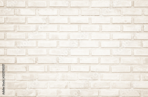 Background of wide cream brick wall texture. Old brown brick wall concrete or stone wall textured  wallpaper limestone abstract flooring Grid uneven interior rock. Home or office design backdrop.