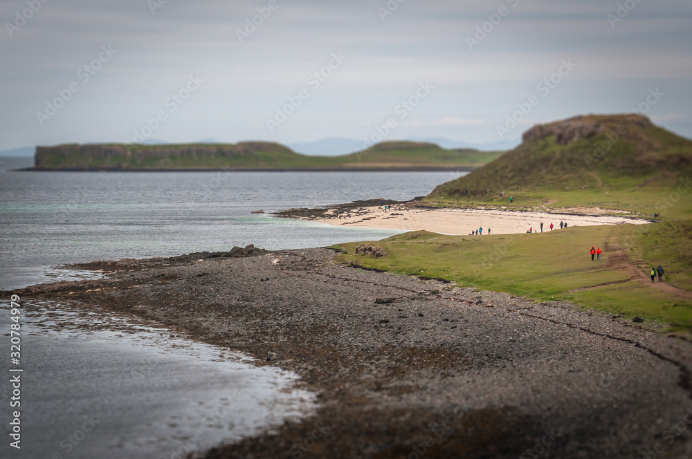 Tilt shift effect of white and black beaches with turquoise sea, Coral Beach, Isle of Skye, Scotland. Concept: famous natural landscape, Scottish landscape, tranquility and serenity, seascape Tilt shift effect of white and black beaches with turquoise sea, Coral Beach, Isle of Skye, Scotland. Concept: famous natural landscape, Scottish landscape, tranquility and serenity, seascape