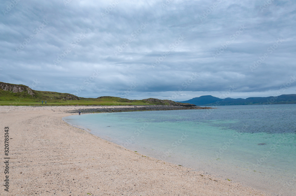 White beach with turquoise sea, Coral Beach, Isle of Skye, Scotland. Concept: famous natural landscape, Scottish landscape, tranquility and serenity, seascape