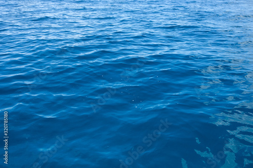 Blue sea water background © photolink