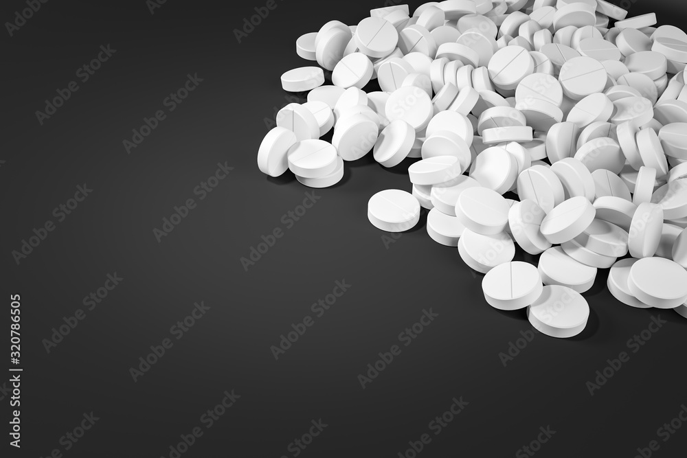 Heap of white round pills at the black table. Top view with copy space. Pharmaceutical industry and health care concept.