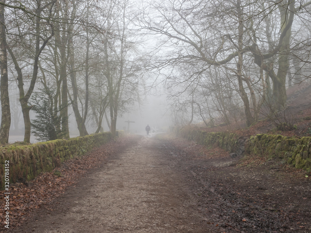 Walking in the fog at Cromford, Derbyshire Walking in the fog at Cromford, Derbyshire