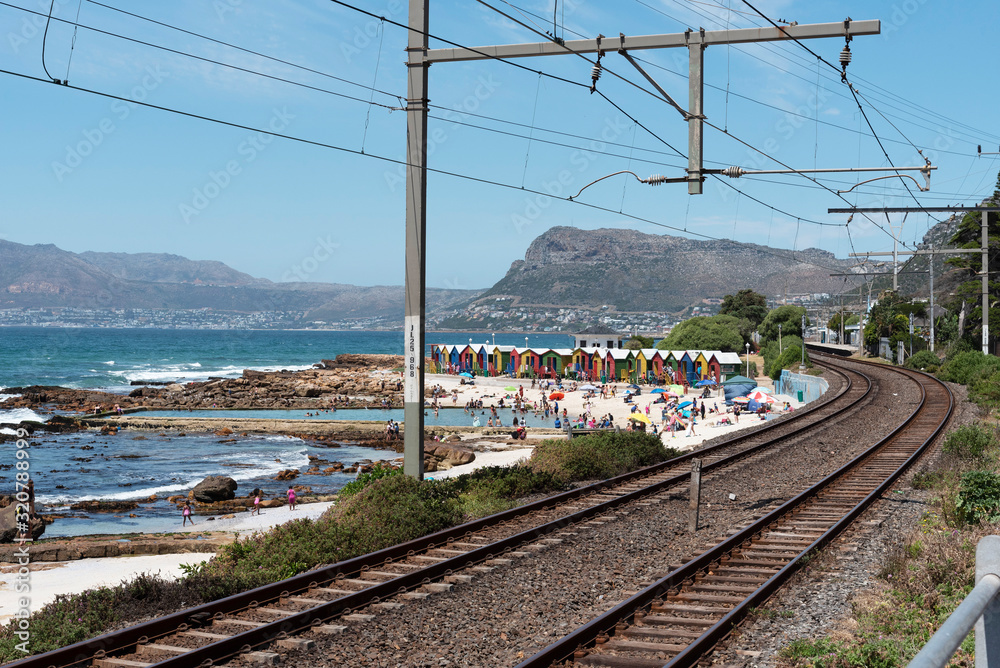 St James, Cape Town, South Africa. Dec 2019. St James a popular coastal resort aand colourful beach huts served by a train service from Cape Town