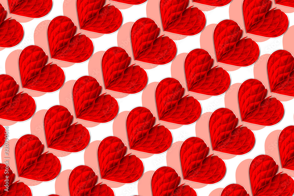 Red hearts of origami on white as background, isolated