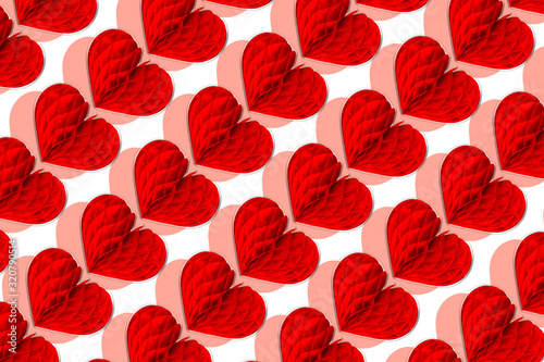 Red hearts of origami on white as background, isolated