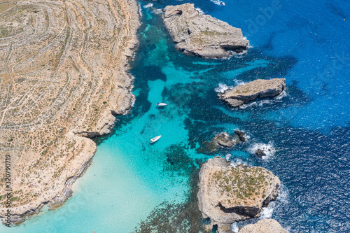 Aerial view drone - blue lagoon among the rocks sea.