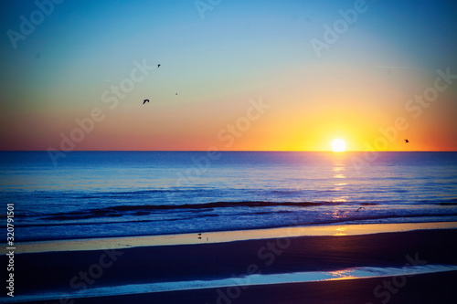 sunrise over the sea © Evelyn Bea
