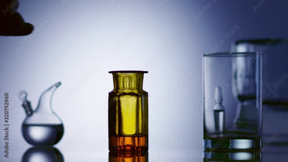 Research in laboratory, medical worker installs test tubes with samples ...