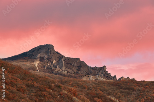 view of the mountain in pink clouds