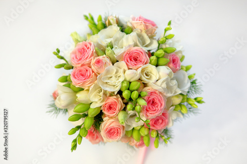 Wedding bouquet of bright flowers and empty space for text