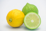 The still life photos of green lemon on white background.