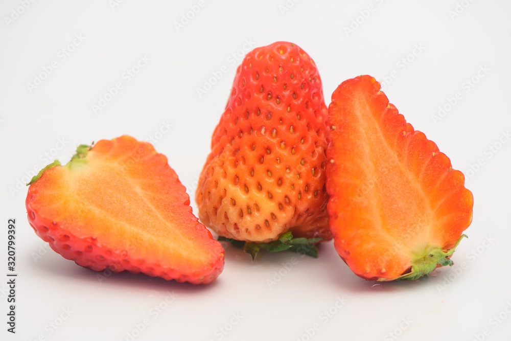 The still life photos of Big and beautiful red strawberries on white background. The still life photos of Big and beautiful red strawberries on white background.