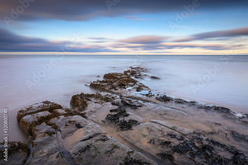Long Exposure at Cocklawburn Beach, a rural beach within Northumberland Coast Area of Outstanding Natural Beauty (AONB), located just south of Berwick-upon-Tweed