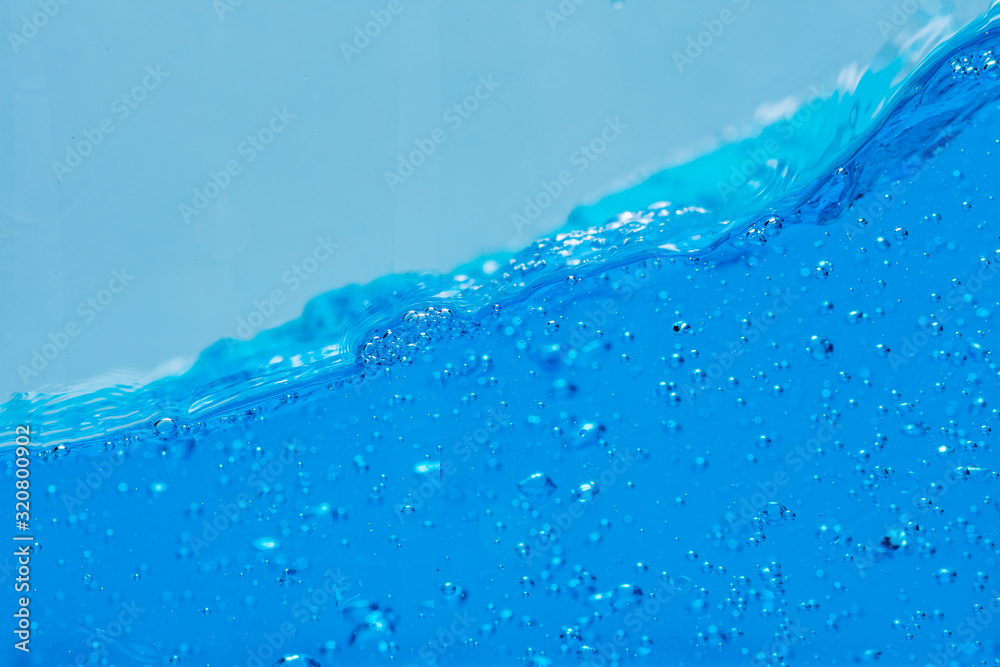 Water and air bubbles over white background with space for text. Water and air bubbles over white background with space for text.