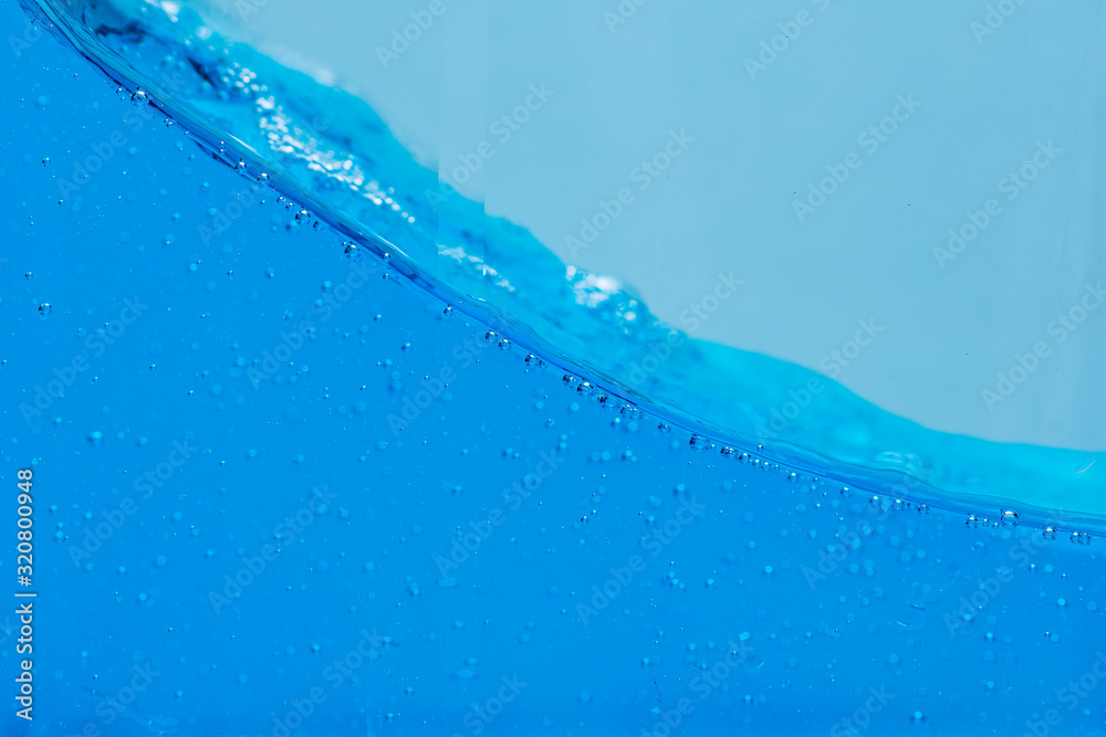 Water and air bubbles over white background with space for text. Water and air bubbles over white background with space for text.