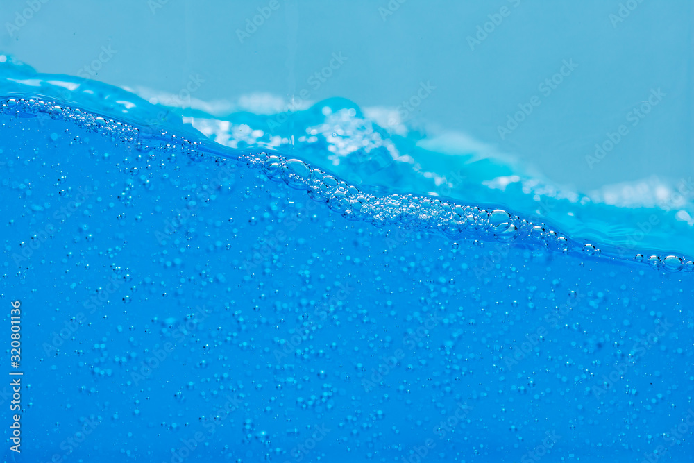 Water and air bubbles over white background with space for text. Water and air bubbles over white background with space for text.