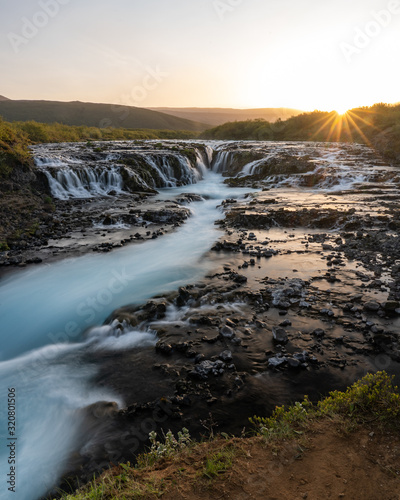 Long exposure of Bruarfoss waterfall before sunset Iceland