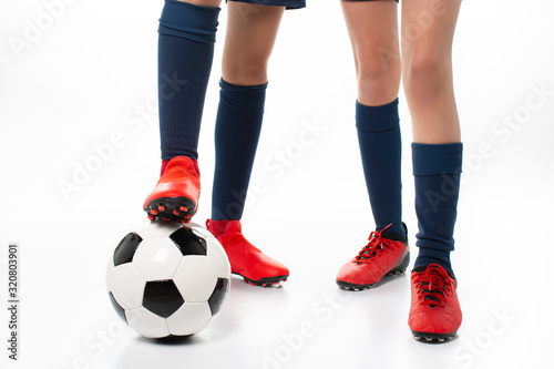two women posing soccer players isolated on white background