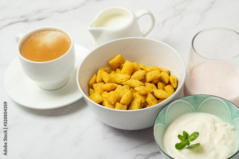black coffee, cereal, milk and yogurt close-up black coffee, cereal, milk and yogurt close-up