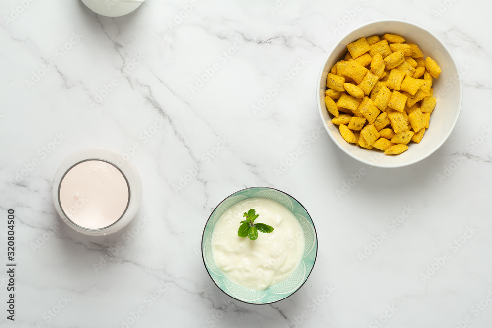 milk, coffee and cereal, yogurt on a white background milk, coffee and cereal, yogurt on a white background