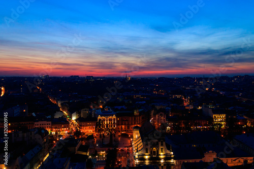 Aerial night view of the old town of Lviv in Ukraine. Lvov cityscape. View from tower of Lviv town hall © olyasolodenko