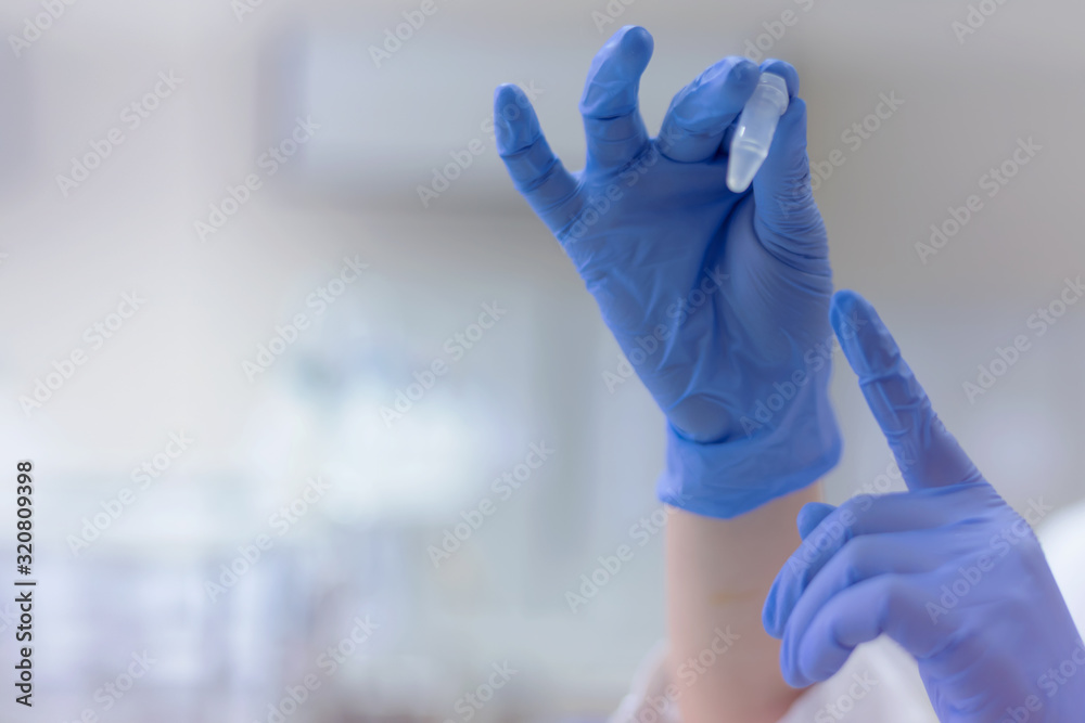 Fototapeta premium Concept Coronavirus. 2019-nCoV. Scientists or doctors research for Corona virus treatment and solution. Research in lab or hospital.