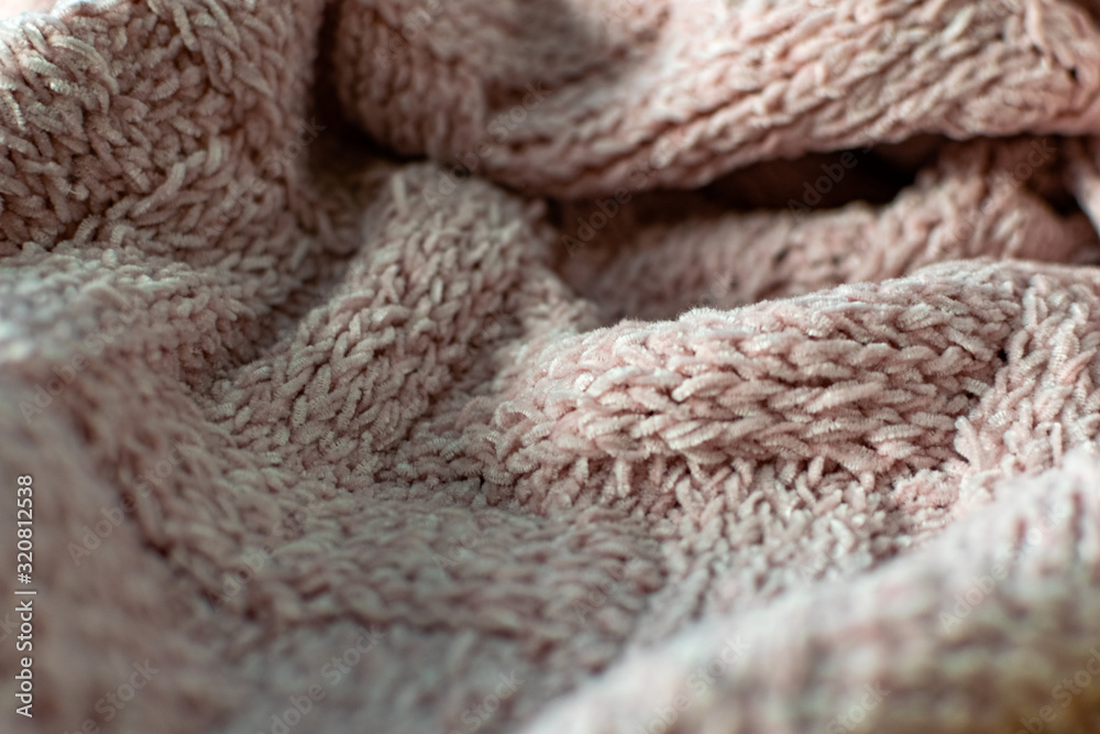 Fine textured and voluminous fabric in pink. Embossed textile pattern, pleasant to the touch and delicate, velvety and textured background for design and decoration. Fine textured and voluminous fabric in pink. Embossed textile pattern, pleasant to the touch and delicate, velvety and textured background for design and decoration.