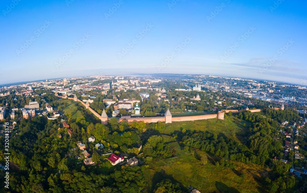 Panorama of the western wall of the Smolensk Kremlin and the old part of the city of Smolensk from a flight height on a summer morning, Russia.