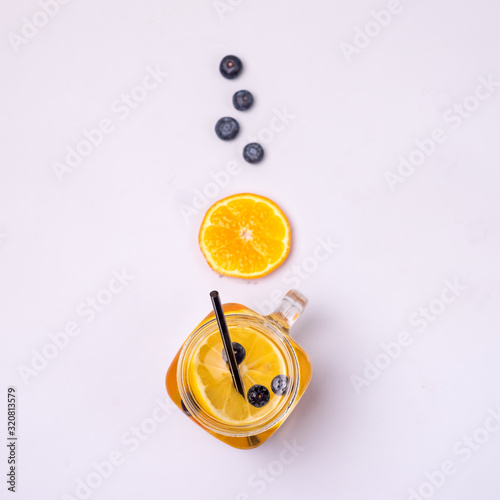 Glass Jars with Fresh Infused Water Made With Organic Fruits and Berries Healthy Detox Drink Top View Orange and Berry Lemonade