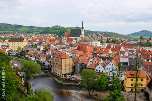 Aerial view of the traditional colorful houses of Cesky Krumlov and Vltava river, in Czech Republic