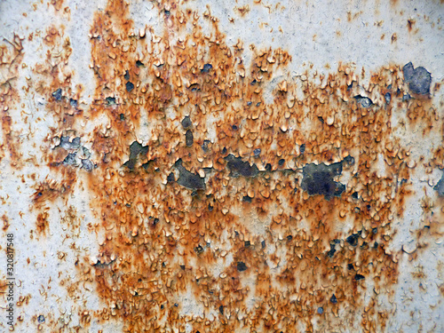 Old rusty wall. Corrosion surface in detail. Metal texture background