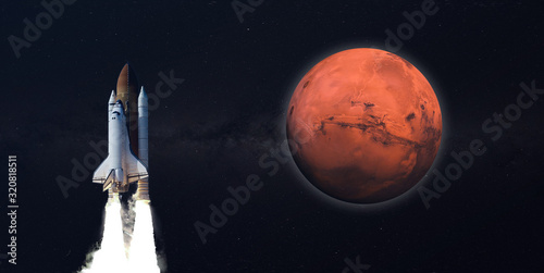 Fototapeta Naklejka Na Ścianę i Meble -  human fly to the planet mars in shuttle rocket, the international space mission elements of this image furnished by nasa
