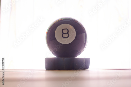 The ball of predictions figure eight on a light background