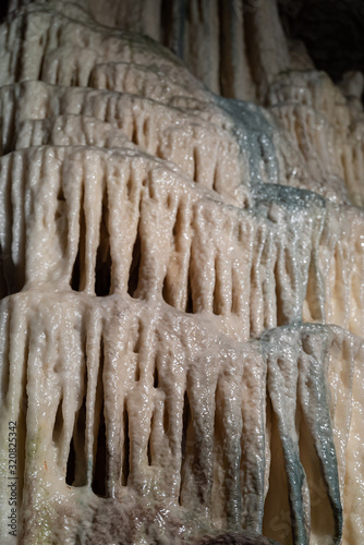 POSTOJNA, SLOVENIJA - JANUARY 28, 2020: Postojna cave -one of the biggest tourist attractions in Slovenia. 24 km long cave system with stalactites and stalagmites.