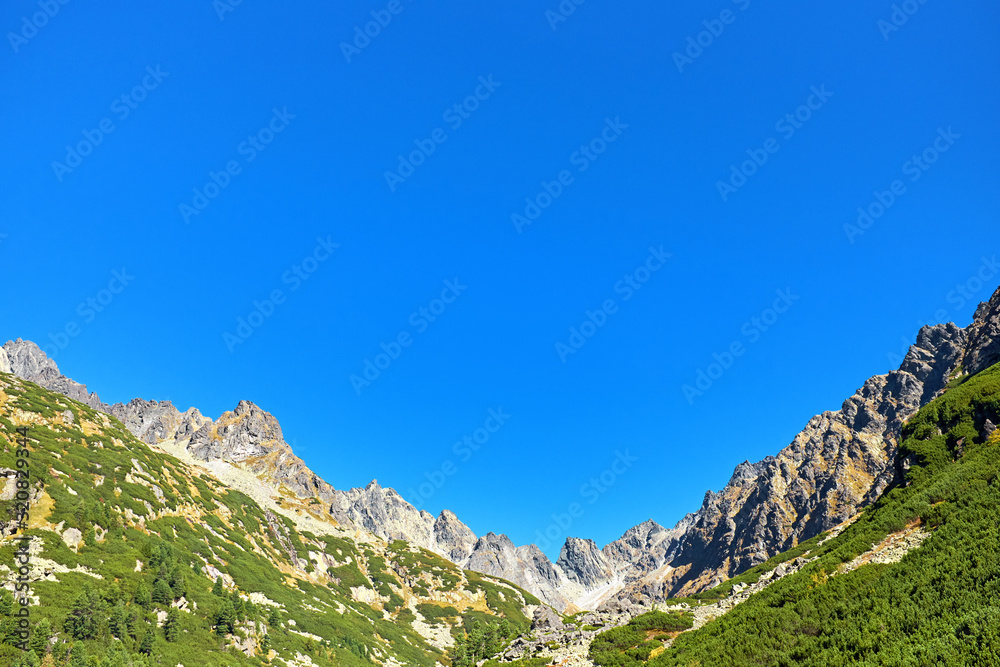 Picturesque mountain peaks with vivid blue sky from High Tatras National Park in Slovakia