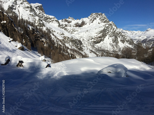 Panoramic view of the snow covered Alpe Misanco in Piedmont Italy. photo