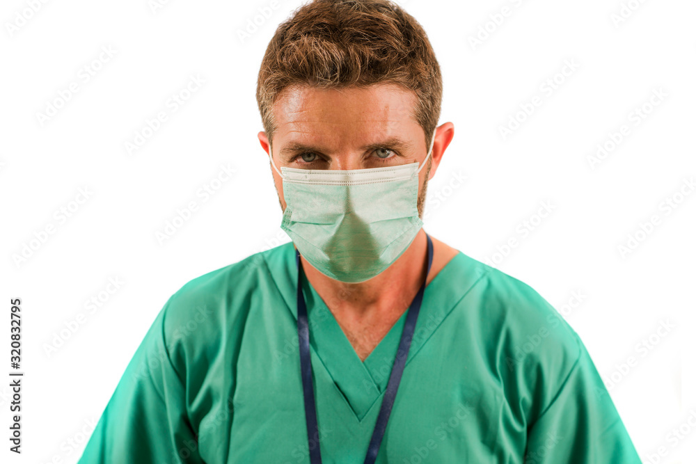 attractive and successful medicine doctor or nurse man posing confident for hospital staff corporate portrait  in green medical uniform and face mask isolated on white