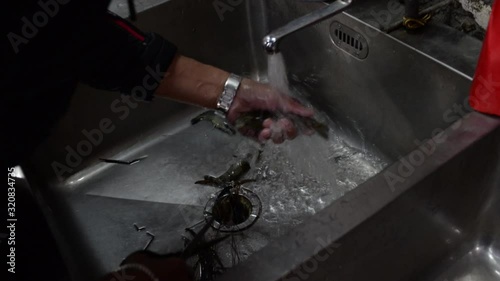 freshwater prawn being prepared on an asian market 