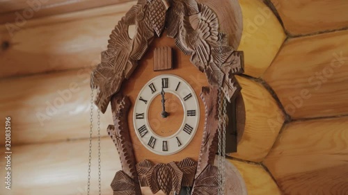 Beautiful wooden old wall clock. photo