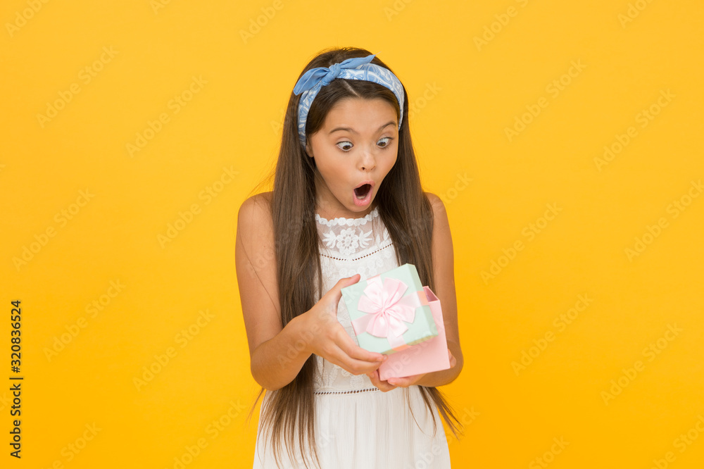 Can not believe her luck. Shocked expression. Summer season. Buy gift. Online shopping. Perfect gift concept. Cute small kid adorable dress. Girl long hair hold gift box. Present for teen girl Can not believe her luck. Shocked expression. Summer season. Buy gift. Online shopping. Perfect gift concept. Cute small kid adorable dress. Girl long hair hold gift box. Present for teen girl