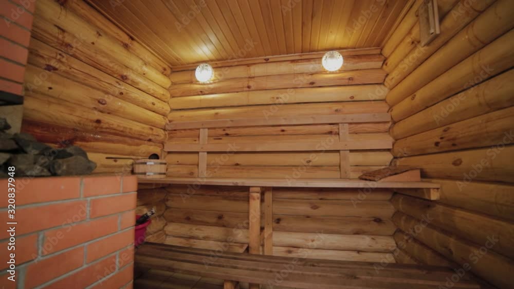 Beautiful sauna interior made of wooden logs. Beautiful sauna interior made of wooden logs.