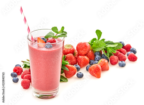 Berry fruits detox fresh smoothie. Colorfull healthy meal diet concept. Mixed red berries smoothie cocktail food background. Creative strawberry, raspberry, blueberry smoothies isolated on white