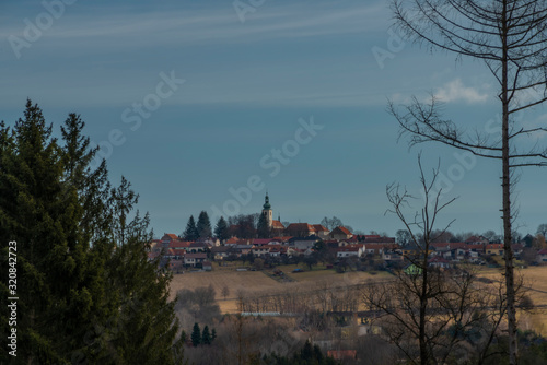 Svaty Jan nad Malsi village on hill in sunny color day in south Bohemia photo
