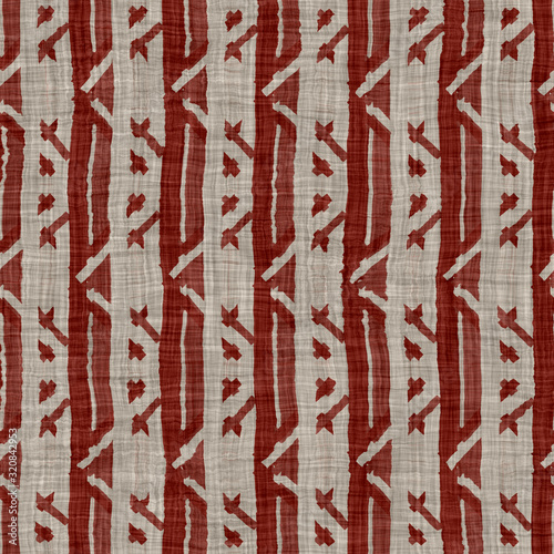 Red maroon french woven linen texture background. Ecru gray printed doodle stri pe textile fibre seamless pattern. Organic traditional country cottage raw fabric. Natural primitive textile backdrop photo