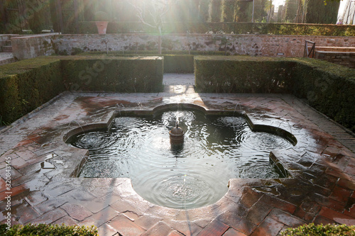 Beautiful fountain in Generalife gardens, Alhambra, Granada, Spain photo